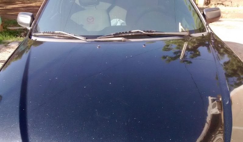 Usados: Mazda 323 2003 japonés potente y rápido lleno