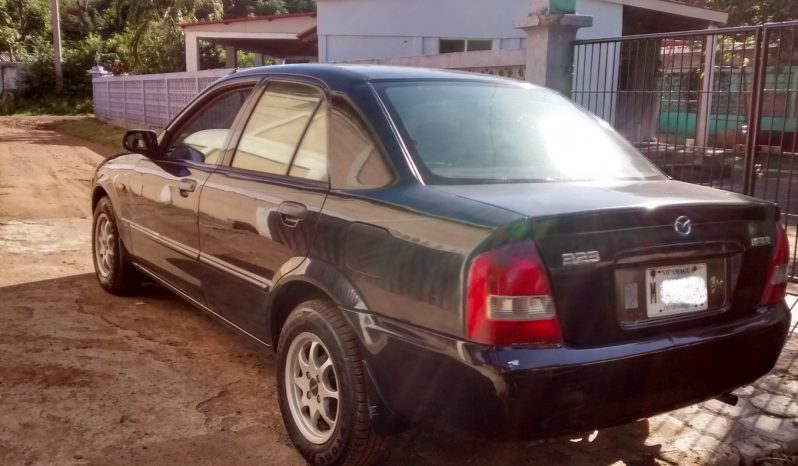 Usados: Mazda 323 2003 japonés potente y rápido lleno