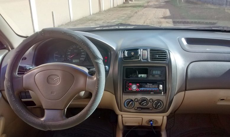 Usados: Mazda 323 2003 japonés potente y rápido lleno