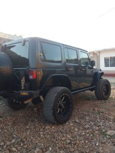 Jeep Wrangler 2016 usado ubicado en Estelí JEEP WRANGLER 2016 UNLIMITED SPORT COLOR NEGRO 4X4--4WD CUATRO PUERTAS
