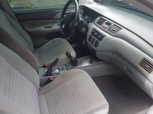Mitsubishi Lancer 2006 usado ubicado en Nicaragua MODELO 2006 MECANICO MOTOR 1.3 - ECONOMICO EN CONSUMO DE COMBUSTIBLE CAJA DE 5 VELOCIDADES MAS RETROCESO