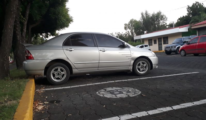 LINDO TOYOTA COROLLA 2004, RINES DE LUJO DE ALUMINIO, SPOILER TRASERO, RADIO PIONERS, BLOOTOO PARA LLAMADAS, USB,VIDRIOS ELECTRICOS. CONTACTO 88302758, NEGOCIABLE.